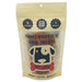A 3 oz resealable stand-up pouch of Saint Rocco's Dog Treats 'Meat Lover' on a plain white background. The packaging is a warm cream/beige color with black text and a cartoon dog logo.