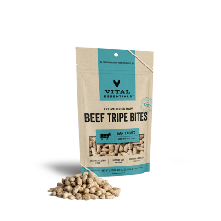 Vital Essentials freeze-dried raw Beef Tripe Bites dog treats with a pile of treats beside the pouch.