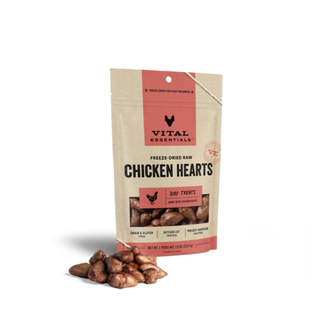 Vital Essentials freeze-dried raw Chicken Hearts dog treats in a small red-label pouch with hearts in front.
