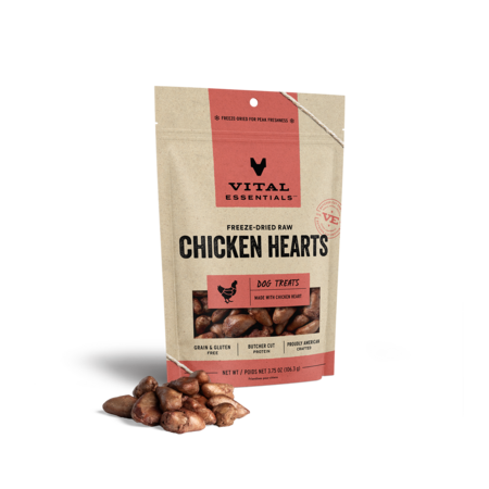 Vital Essentials freeze-dried raw Chicken Hearts dog treats in a larger red-label pouch with hearts in front.