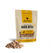 Vital Essentials freeze-dried raw Duck Bites dog treats in a larger yellow-label pouch with treats in front.