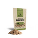 Vital Essentials freeze-dried raw Rabbit Bites dog treats in a small green-label pouch with treats in front.
