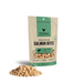 Vital Essentials freeze-dried raw Salmon Bites dog treats with a pile of light-colored bites beside the pouch.