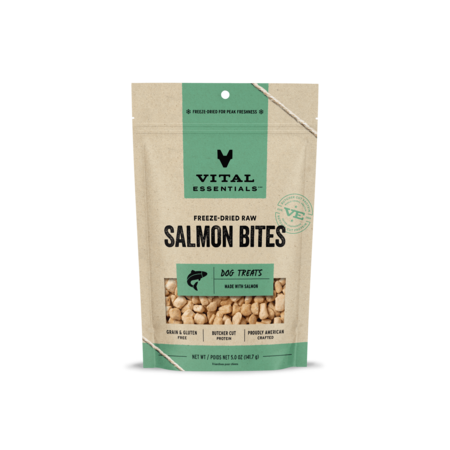 Vital Essentials freeze-dried raw Salmon Bites dog treats in a beige and green pouch.