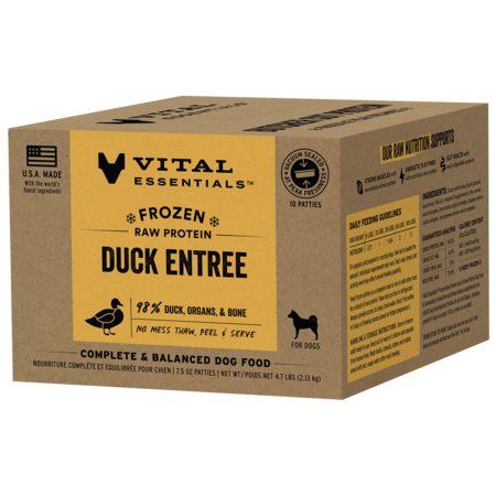 Vital Essentials frozen raw Duck Entrée patties for dogs in a brown box with a yellow label.