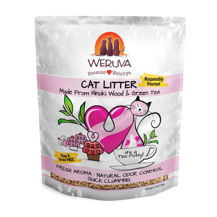 Weruva clumping cat litter made with hinoki wood and green tea, white-and-pink bag with a cartoon cat and green leaves.