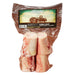 A package of four Tucker's Bone Co. beef bone 3-in-1 sticks in a clear plastic bag with a brown label, shown on a white background.