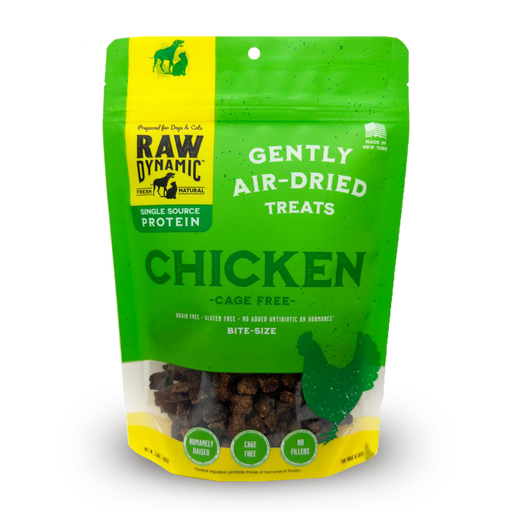 Green package of Raw Dynamic chicken treats on a white background