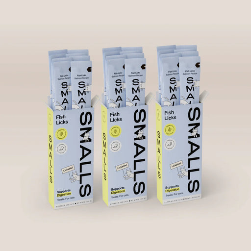 Three boxes of Smalls Fish Licks Salmon Recipe lickable cat treats, with individual treat sticks visible above each box.