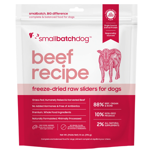 A stand-up pouch of smallbatchdog beef recipe freeze-dried raw sliders for dogs, featuring a white and dark pink design with a pink illustration of a cow and product details.