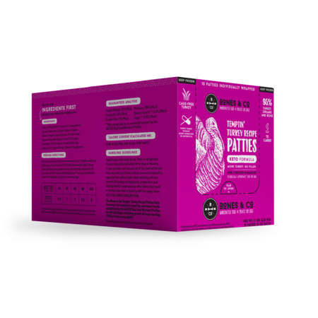Purple box of dog food patties with text and branding on a white background