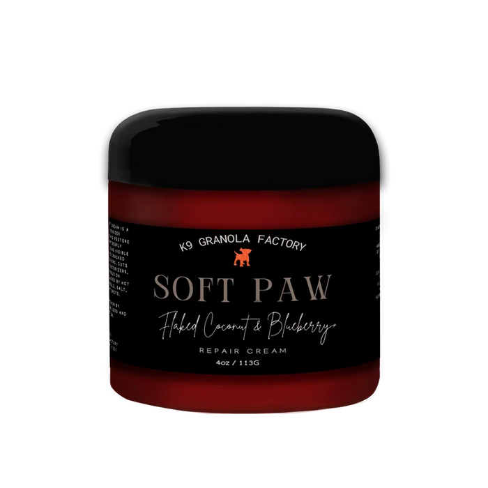 Jar of soft paw flaked coconut and blueberry cream with a black label.